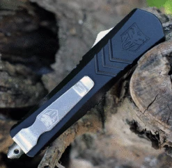 CobraTec Black FS-X OTF Knife CTKSBLKFS-XSDAG2SS, 2.75" D2 Steel Dagger Serrated Blade, Black Aluminum Handle -The Knife Shop sblkfs xsdag2ss.2 56486.1623961487